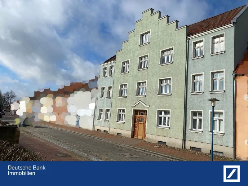 Frontansicht Mehrfamilienhaus - Haus kaufen in Friedland - Eine Solide Kapitalanlage im Zentrum der Stadt!