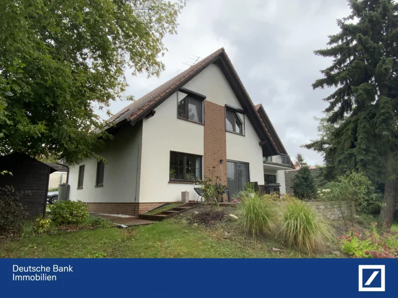 Gartenansicht  - Haus kaufen in Schenkendöbern - Ein Familiennest in Hanglage