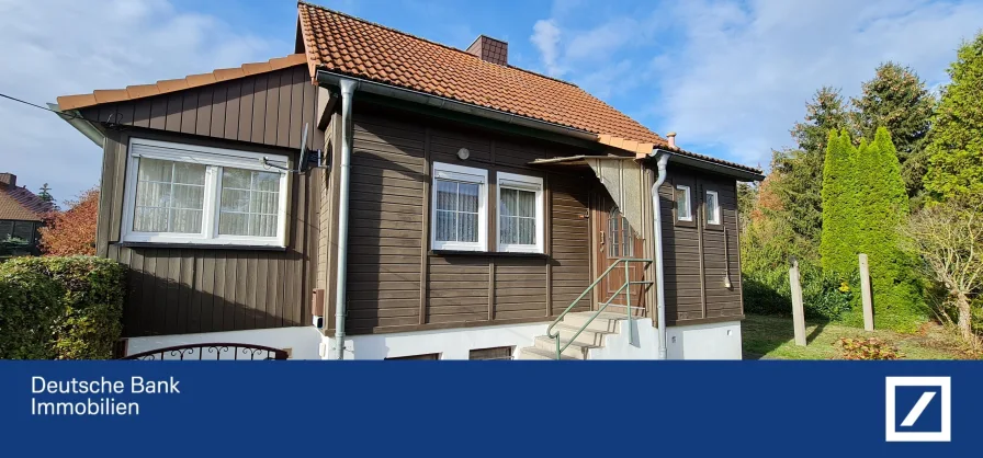 Ansicht Haupteingang - Haus kaufen in Helbra - Häuschen in der Holzhaussiedlung von Helbra