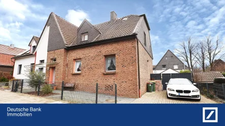 Hausfront - Haus kaufen in Oberhausen - Oberhausen-Barmingholten: Modernisiertes Einfamilienhaus mit Garten in naturnaher Lage