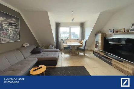 Wohnzimmer - Wohnung kaufen in Leverkusen - Moderne 3-Zimmer-Wohnung mit Balkon in Wiesdorf