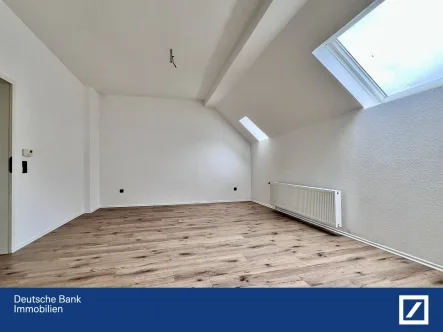 Wohnzimmer 1 - Wohnung kaufen in Solingen - Kapitalanlage gesucht? - Dachgeschosswohnung in SG-Mitte