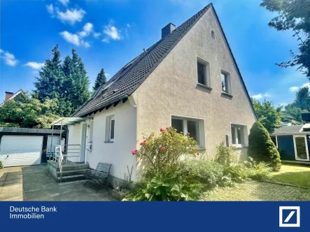 Hausfront - Haus kaufen in Münster - Ein Haus für die ganze Familie – Freistehendes Einfamilienhaus mit Garten und Garage