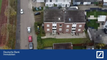 Luftaufnahme - Haus kaufen in Rheine - Attraktive Kapitalanlage in Rheine: Mehrfamilienhaus in Top-Lage