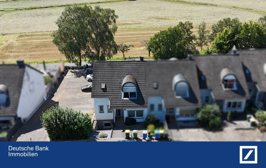 Schönes Reihenendhaus - Haus kaufen in Marburg - Attraktives Reihenendhaus in Dagobertshausen: Großzügig, modernisiert und mit Weitblick