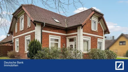 Ansicht - Haus kaufen in Bassum - Historisches Rotsteinhaus mit Potenzial – Großzügiges Grundstück und Ausbaureserve