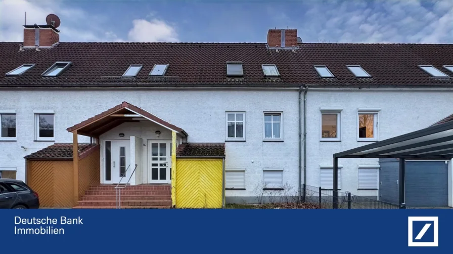 Vorderansicht - Haus kaufen in Bremen - Viel Platz in beliebter Wohnlage: Großzügiges Reihenmittelhaus in Huchting!