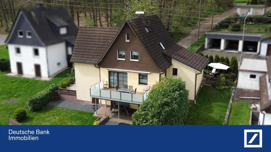 Rückseite - Haus kaufen in Siegen - Charmantes Einfamilienhaus zum Wohlfühlen