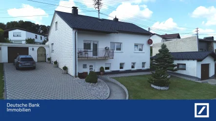 Seitenansicht - Haus kaufen in Seck - Ideal für die ganze Familie!