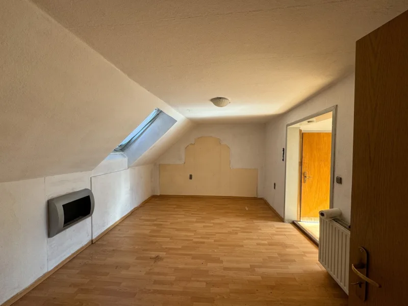 Wohnzimmer  DG Wohnung