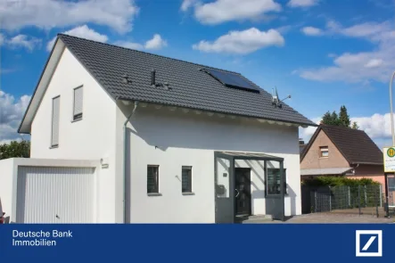 Frontseite - Haus kaufen in Niederkrüchten - Freistehendes, modernes Einfamilienhaus in ländlicher Lage mit exzellenter Anbindung ins Rheinland