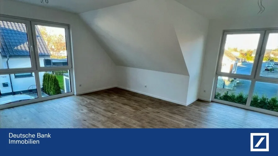 Wohnbereich - Wohnung kaufen in Lippstadt - Exklusive Maisonettewohnung mit Dachterrasse, Erdwärmepumpe und einer Garage! Schlüsselfertig!