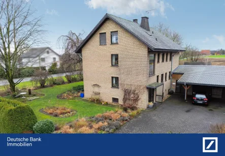 Straßenansicht - Haus kaufen in Wadersloh - Reserviert: Großzügiges Mehrfamilienhaus mit idyllischem Garten und zeitlosem Komfort