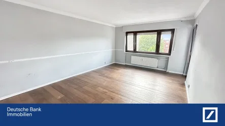 Wohnzimmer - Wohnung kaufen in Verl - Traumhafte Etagenwohnung in ruhiger Lage am Verler See mit Balkon und Stellplatz