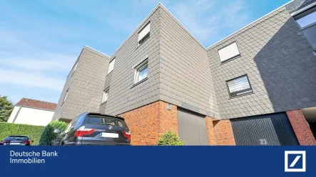 Front - Haus kaufen in Gütersloh - Schönes und gepflegtes Reihenmittelhaus mit ca. 47 m2 Ausbaureserve, Garage und Stellplatz!