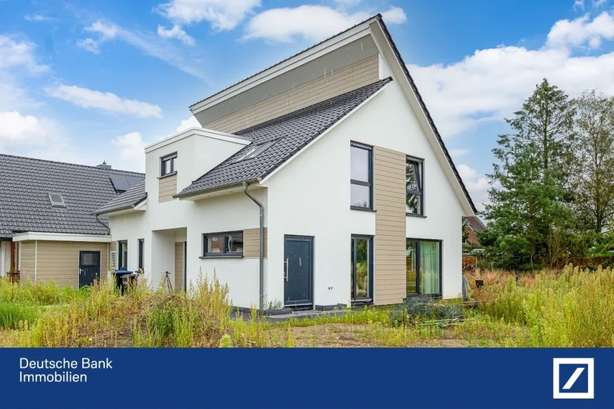 Seitenansicht - Haus kaufen in Schwanewede - Exklusiver Neubau mit tollem Grundstück zur freien Gestaltung in Top Lage von Schwanewede!