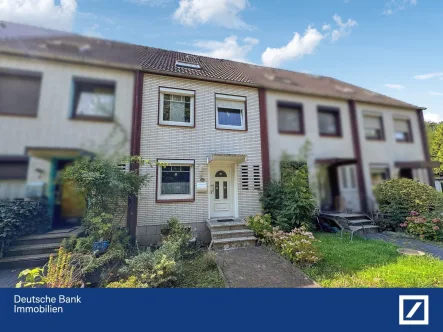 Vorderansicht - Haus kaufen in Geestland - Charmantes Reihenmittelhaus in Top Lage von Langen (Geestland)