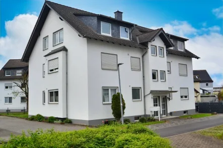 Seitenansicht - Haus kaufen in Sankt Augustin - Vollvermietetes 6-Parteienhaus mit großem Potenzial!!