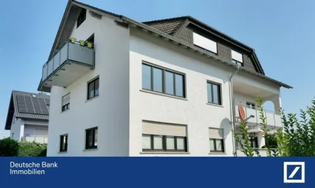 Hausansicht - Wohnung kaufen in Karben - Großzügig, modern, gemütlich: Ihre neue Wohnung in idyllischer Lage!