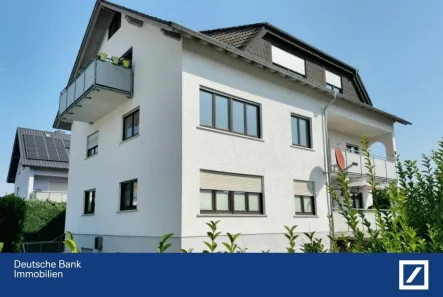 Hausansicht - Wohnung kaufen in Karben - Großzügig, modern, gemütlich: Ihre neue Wohnung in idyllischer Lage!