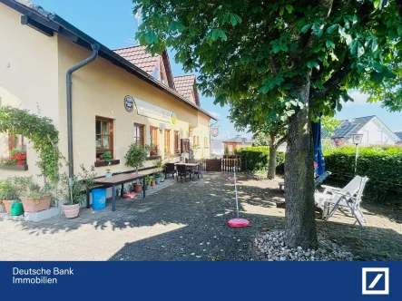 Biergarten - Gastgewerbe/Hotel kaufen in Singen - Solides Gasthaus. Sonniger Biergarten. Fremdenzimmer + 2 Ferienwohnungen