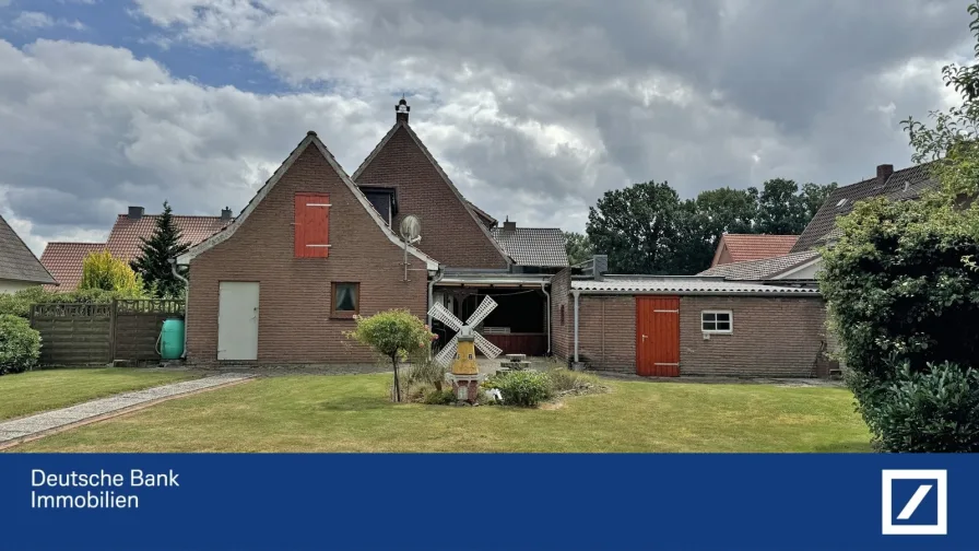 Gartenansicht - Haus kaufen in Emstek -  Charmantes Einfamilienhaus auf großem Grundstück mit herrlichem Garten