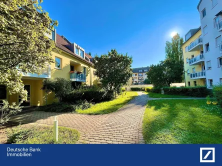 Rückansicht - Wohnung kaufen in Nürnberg - Zentral und Gemütlich: 3-Zimmer Wohnung mit TG-Stellplatz, Einbauküche und Balkon in Nürnberg !!! 