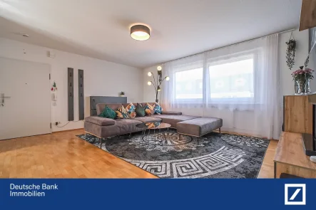 Wohnzimmer - Wohnung kaufen in Herzogenaurach - Exklusiver Rückzugsort: moderne 4-Zimmer Wohnung mit Einbauküche und Carport