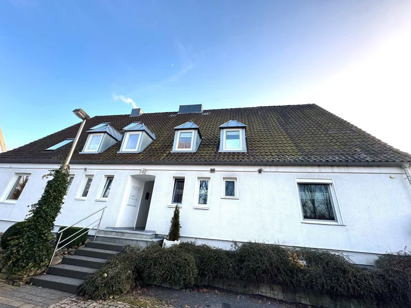 Hausansicht - Wohnung kaufen in Osterode - Einzigartige Maisonette-Wohnung in Osterode – Ihr neues Zuhause mit Charme