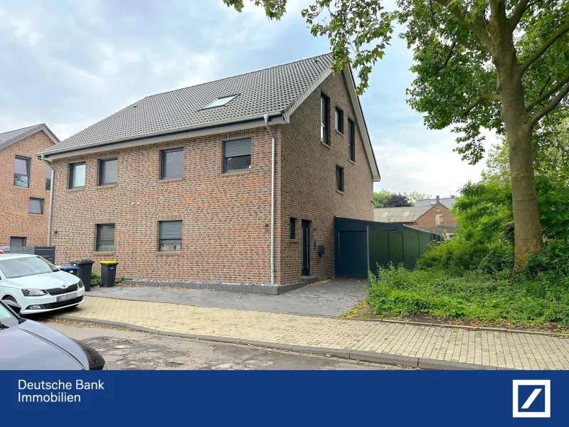 Hausansicht - Haus kaufen in Gelsenkirchen - Moderne Doppelhaushälfte mit hochwertiger Ausstattung und idyllischem Garten