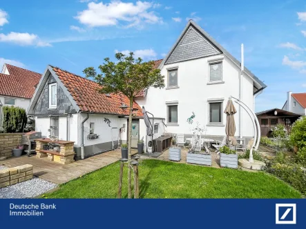  - Haus kaufen in Rinteln - Charmantes Zuhause: Vielseitige Räume, Großer Garten und Top Lage! 