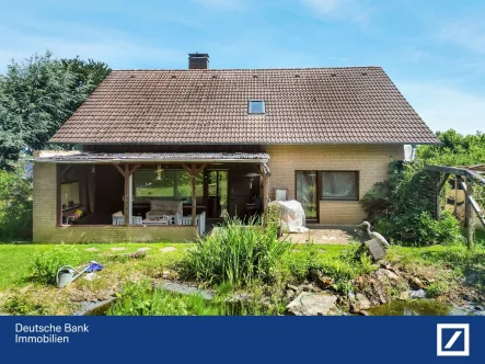  - Haus kaufen in Hille - Doppeltes Wohnvergnügen im Grünen mit großzügigem Grundstück