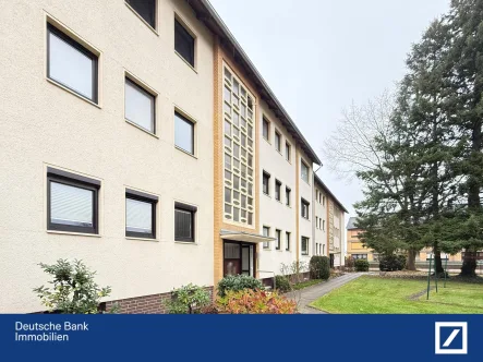 Hausansicht - Wohnung kaufen in Bückeburg - Gepflegte Wohnung mit Einbauküche und Gartenblick – Ihr neues Zuhause in Bückeburg