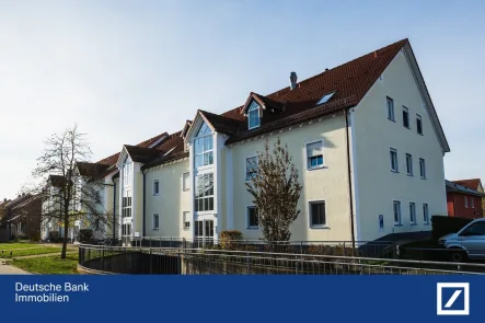 Hausansicht - Wohnung kaufen in Wustermark - Vermietete 2-Zimmerwohnung im Zentrum von Wustermark.