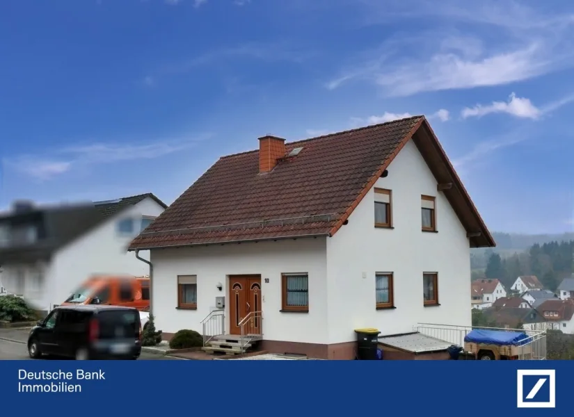 Ansicht - Haus kaufen in Ronshausen - gepflegtes Eigenheim mit herrlichem Fernblick !