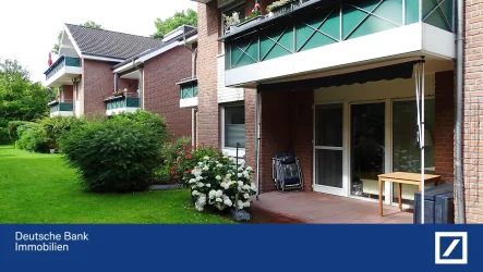 Ansicht Terrasse mit Garten - Wohnung kaufen in Dinslaken - Eigentumswohnung *ca. 68,54 m² mit Aufzug *Tiefgaragenstellplatz *Gartenanteil in gepflegter Anlage 