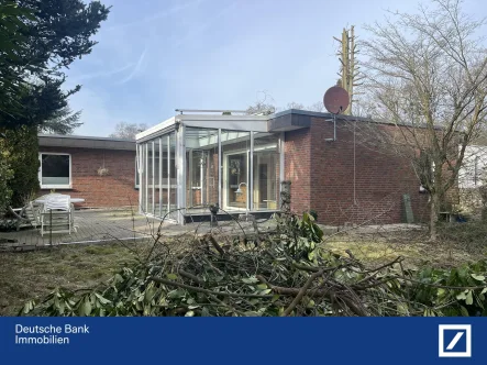 Garten Terrasse Wintergarten - Haus kaufen in Kleve - Materborn: Klassischer Bungalow mit Wintergarten, Teilkeller, Garage und Garten