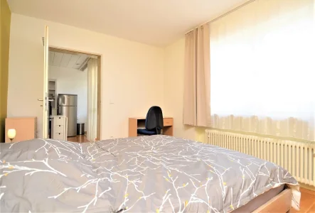 Schlafzimmer - Wohnung kaufen in Augsburg - Charmante Wohnung im Herzen von Augsburg – Perfekte Kapitalanlage oder Eigenheim