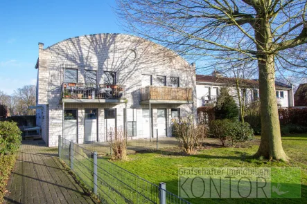 Außenansicht - Wohnung kaufen in Nordhorn - Attraktive 3-Zi.-Wohnung mit Balkon & Carport