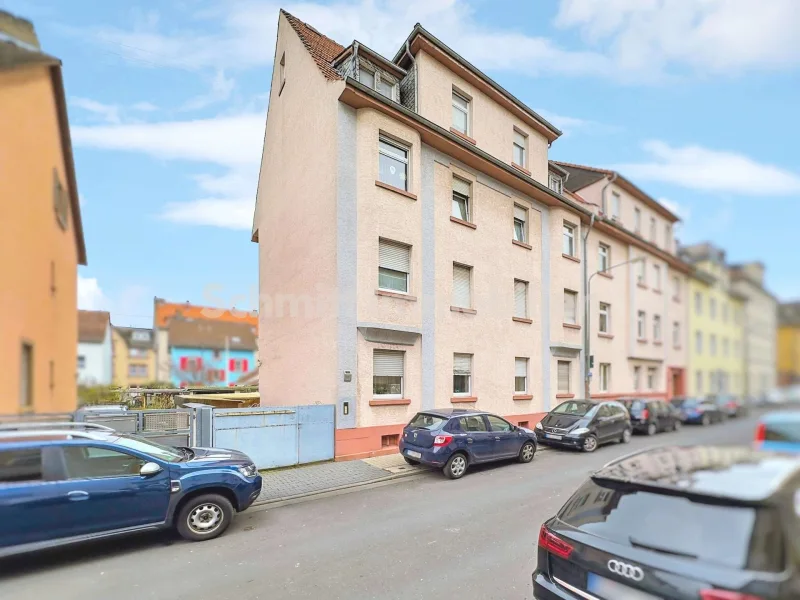 Haus-Ansicht - Haus kaufen in Frankfurt am Main - Attraktive Investitionsmöglichkeit: 7-Familienhaus in aufstrebender Lage von F-Nied