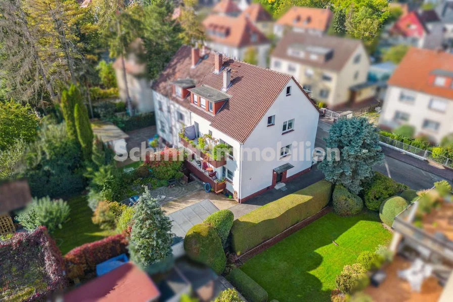 Haus-Ansicht - Haus kaufen in Frankfurt am Main - Ideale Kombination aus Eigenheim & Kapitalanlage. 3-Familienhaus. F-Schwanheim