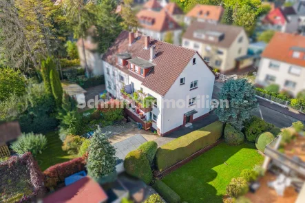 Haus-Ansicht - Haus kaufen in Frankfurt am Main - Ideale Kombination aus Eigenheim & Kapitalanlage: 3-Familienhaus in Frankfurt, Schwanhein