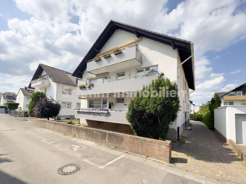 Haus-Ansicht - Haus kaufen in Mörfelden-Walldorf - Freistehendes Mehrfamilienhaus. 7 Einheiten & 3 Stellplätze. In Walldorf