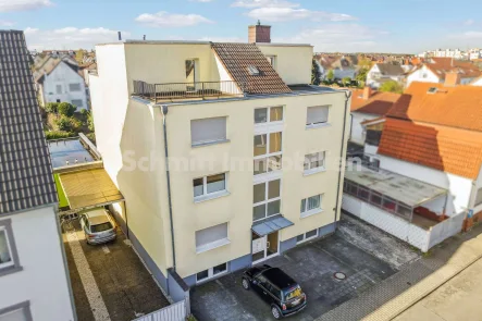 Haus-Ansicht - Haus kaufen in Mörfelden-Walldorf - Mehrfamilienhaus mit Penthouse in Mörfelden-Walldorf