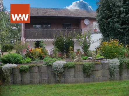 Gartenansicht 1 - Haus kaufen in Heidenrod / Algenroth - "Bungalow einmal anders.....!"