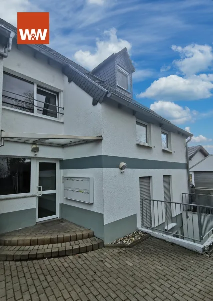 Hauseite 1 - Wohnung kaufen in Ingelheim am Rhein - #Helle 2 Zimmer ETW, Kochecke, Duschbad und grosse Terrasse
