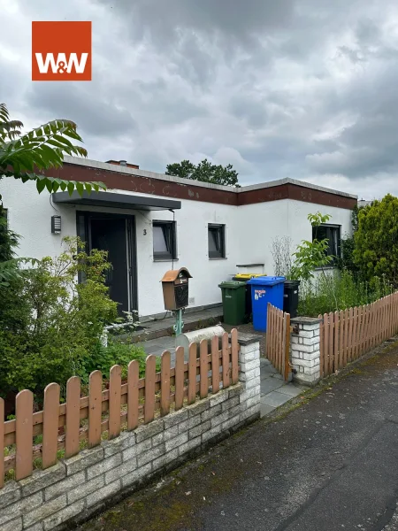 Hausansicht 1 - Haus kaufen in Rodgau / Weiskirchen - Perfekt für Familien: Attraktive Bungalow in Weiskirchen