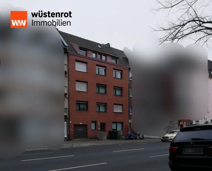 Straßenansicht - Haus kaufen in Düsseldorf / Heerdt - Anlageobjekt oder selber bewohnen? Beides möglich im beliebten Düsseldorf-Heerdt!