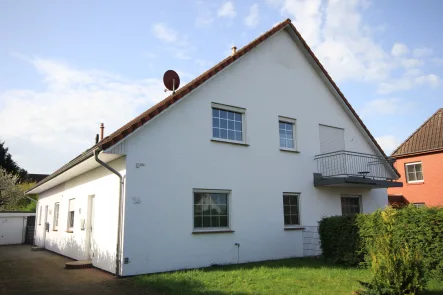 Straßenansicht - Haus kaufen in Dörverden - Vermietung oder Selbstnutzung