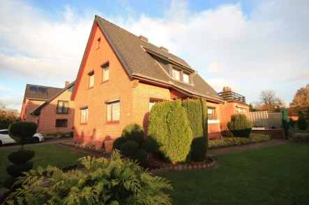 Süd-West-Ansicht - Haus kaufen in Dörverden - Solides Haus mit viel Platz in ruhiger Lage!